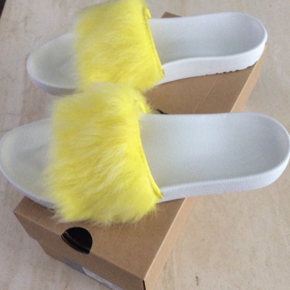 yellow fur ugg slides